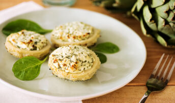 Coeurs d'artichaut gratinés au chèvre et aux épinards